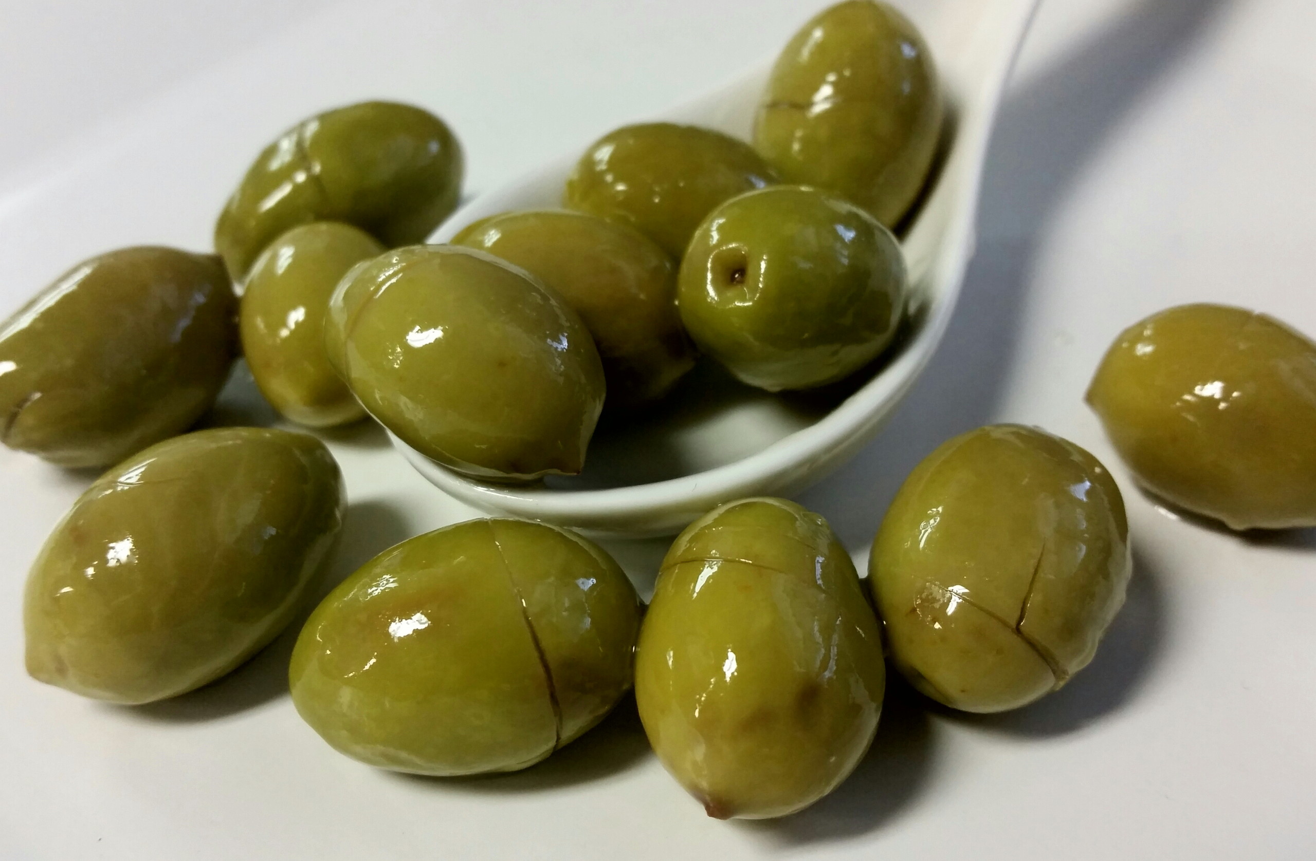 Greek Green Cracked Naflion Olives per lb.